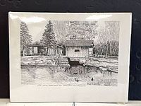 Full view of unframed signed drawing on white background