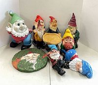 Group shot of all gnome statues and plaques