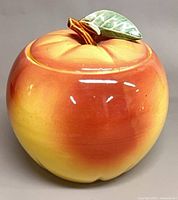 Front view of apple cookie jar with lid