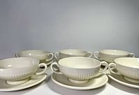 Six bowls and six saucers grouped together