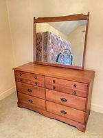 Front view of dresser with attached mirror