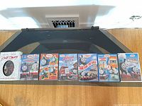 Top view of stand displaying included DVDs