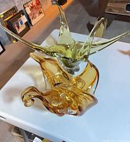 Amber and olive green Chalet art glass bowls overview