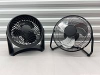 Two fans side by side front view
