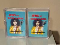 Front view of two information card packs in clear cases