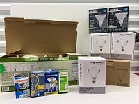 Group shot of all boxed bulbs and open Bioluz box