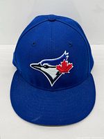 Front view showing embroidered Toronto Blue Jays logo and visor