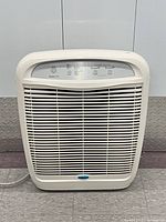 Front view of Whirlpool Whispure 510 air purifier showing grille and control panel