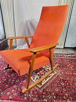 Three-quarter front view showing full chair and upholstery color