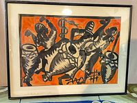 Frontal view of framed Haitian painting with mat and glazing