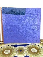 Front view of textured purple abstract painting on panel