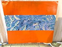 Front view of abstract painting with orange and blue sections