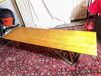 Full view of rectangular coffee table showing top surface and legs