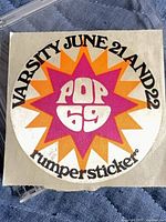 Front view of round Pop 69 Rumpersticker sticker