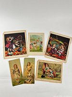 All six lithographs laid out to show range, size and condition