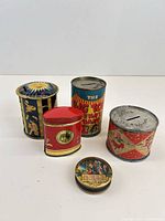 Group shot of all five lithographed tin banks