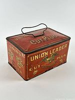 Three-quarter view showing lid, handle and side graphics