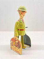 Full right side view showing litho suitcases with dog graphics and soldier profile