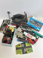 Overall lot with trains, track, Pier set box and scenery accessories