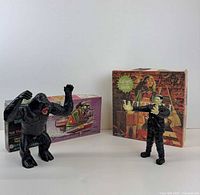 Group shot of two monster figures with Weird-ohs and Frankenstein model kit boxes