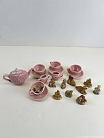 Full lot showing tea set pieces and figurines