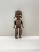 Front full-body view of doll showing height, condition, facial details, hands and feet