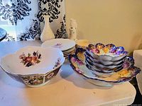 Group shot of all porcelain pieces on table