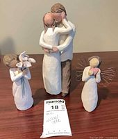 Front view of all three Willow Tree figurines