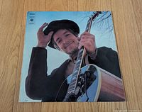 Front cover showing Bob Dylan holding guitar