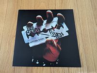 Front cover of British Steel LP sleeve