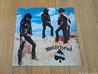 Front album cover with band photo