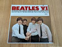 Front album cover showing Beatles VI title and group photo