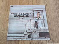 Front cover showing album art and title