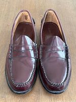 Front top view of both loafers showing uppers, color and styling