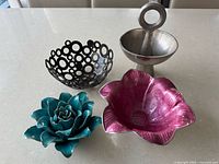 Group shot of all four décor pieces on tabletop