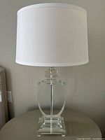 Full view of lucite lamp with shade