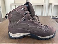 Left side view of right boot showing upper materials and sole