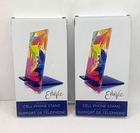 Front view of both boxed stands