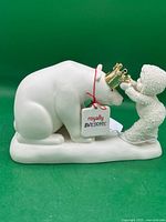 Front view of Snowbabies crowning polar bear figurine