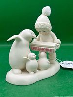 Front view of Snowbabies Peppermint Fish figurine