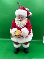 Front view of Department 56 Possible Dreams Clothtique Santa figurine