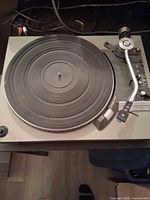 Top view of Technics SL-23 turntable showing platter, tonearm and controls