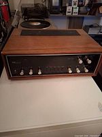 Front view showing faceplate, knobs and sliders