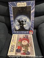 Both puzzle boxes front view