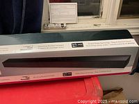 Retail box showing full length image of the soundbar