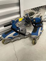 Pair of rollerblades front angle showing color, wheels and boot design