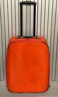 Front view of suitcase with handle extended