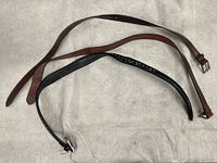Overview of three belts laid flat