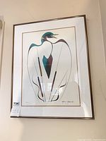 Front view of framed signed loon print