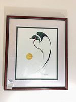 Frontal view of framed print showing image, mat and frame